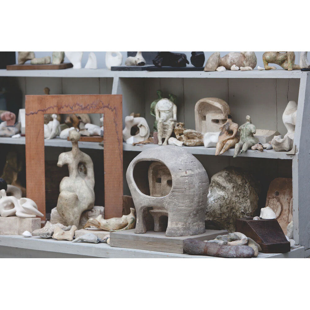 Plaster maquettes on the shelves in Henry Moore's Bourne Maquette Studio, Perry Green