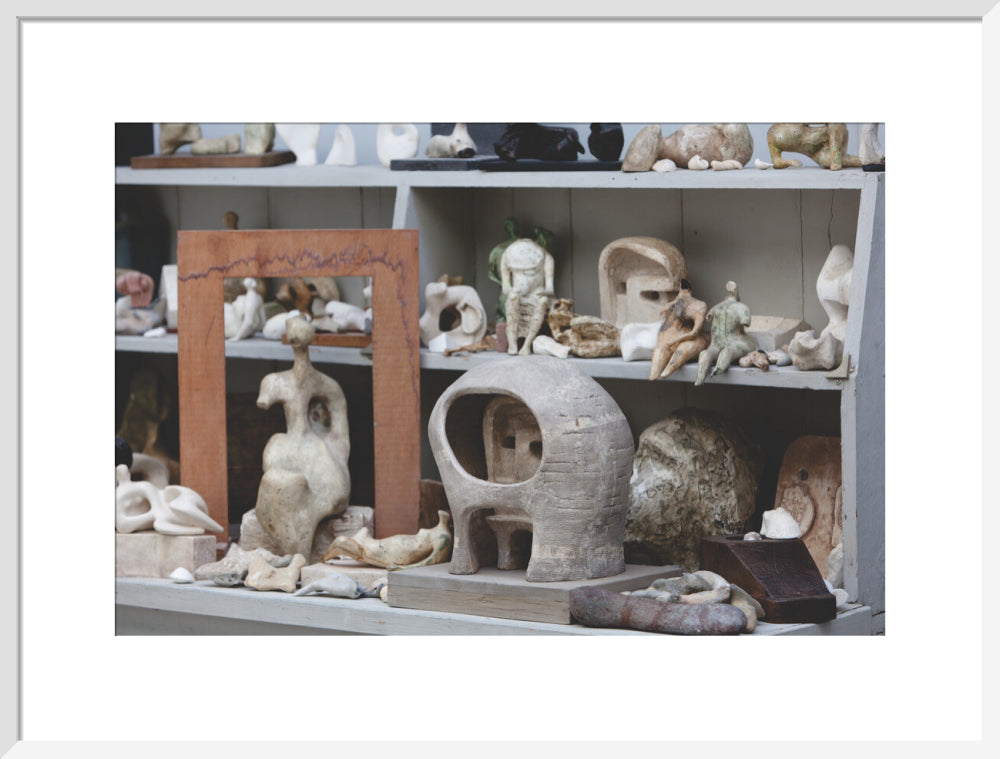 Plaster maquettes on the shelves in Henry Moore's Bourne Maquette Studio, Perry Green