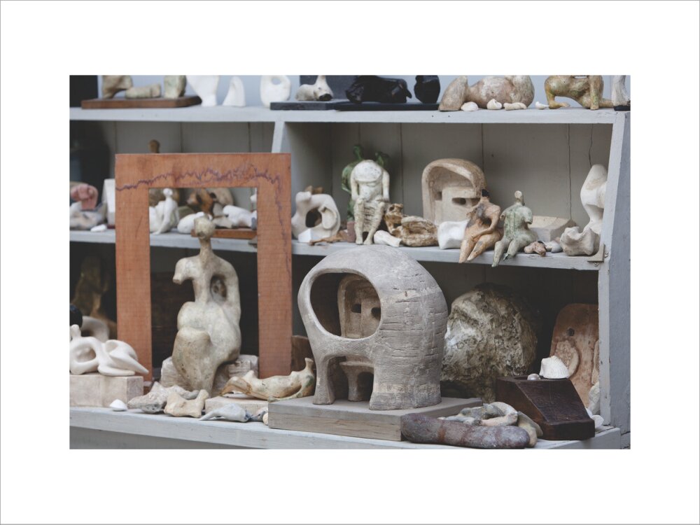 Plaster maquettes on the shelves in Henry Moore's Bourne Maquette Studio, Perry Green