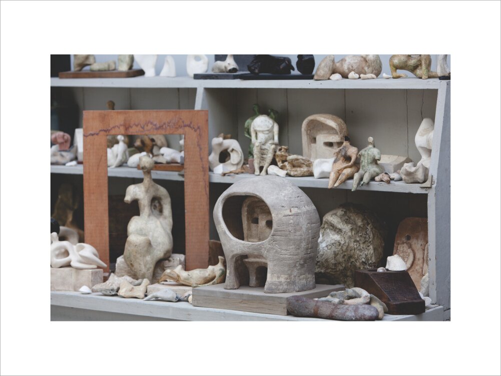 Plaster maquettes on the shelves in Henry Moore's Bourne Maquette Studio, Perry Green