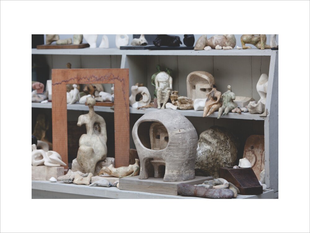 Plaster maquettes on the shelves in Henry Moore's Bourne Maquette Studio, Perry Green